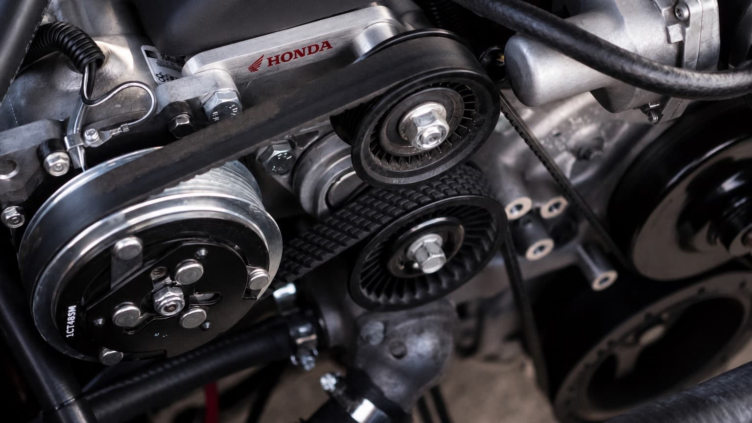Honda serpentine belt and pulley in genuine service